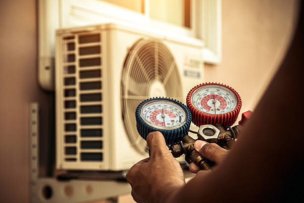 Professional Air Conditioning Service technician working in Zavalla, TX